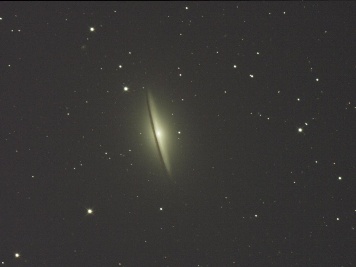 The striking dark dust lane of the Sombrero Galaxy (M104), captured directly via our telescope.