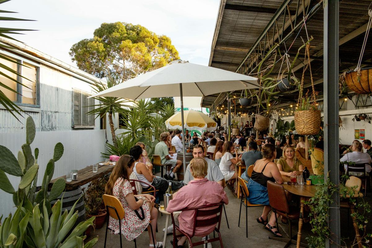 Our pergola space, cafe seating by day & event space by night