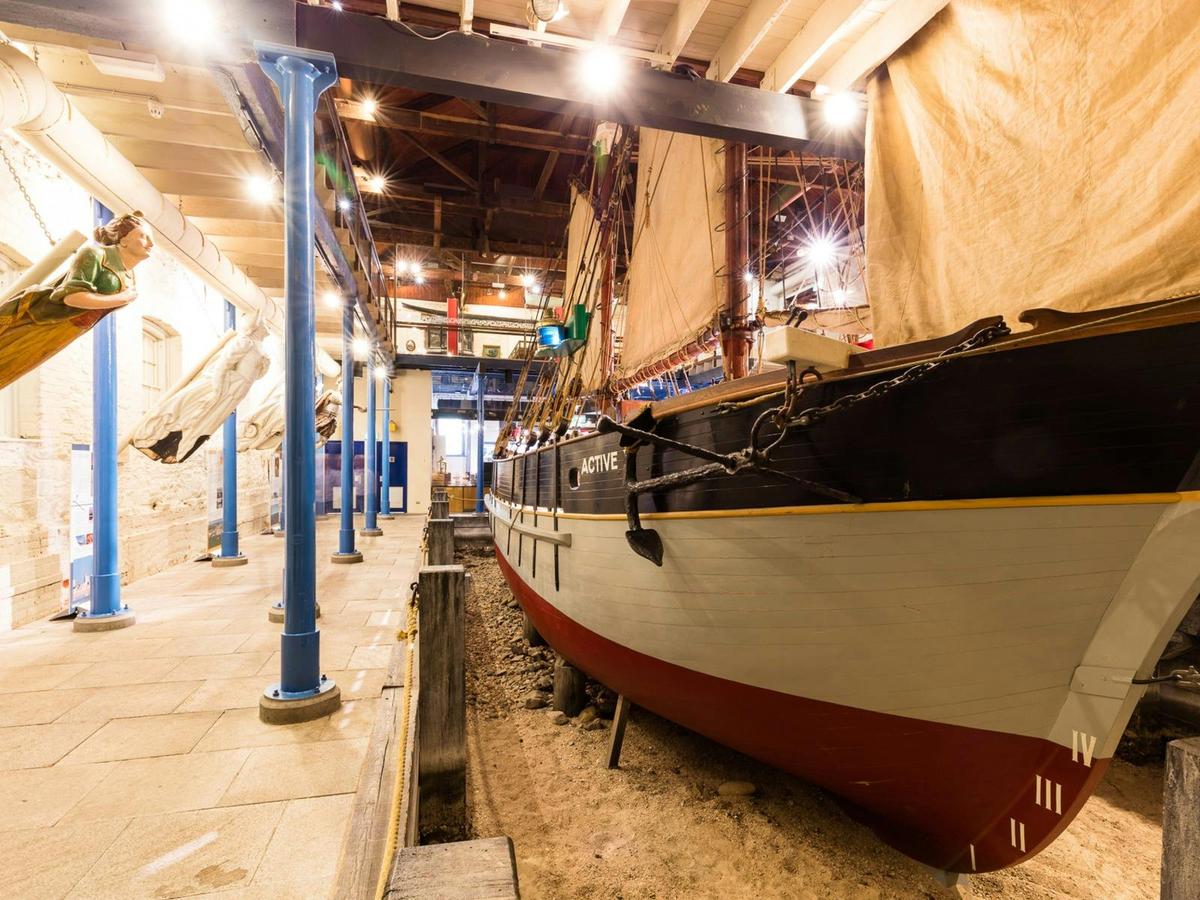 Replica ketch and figurehead exhibits inside the SA Maritime Museum