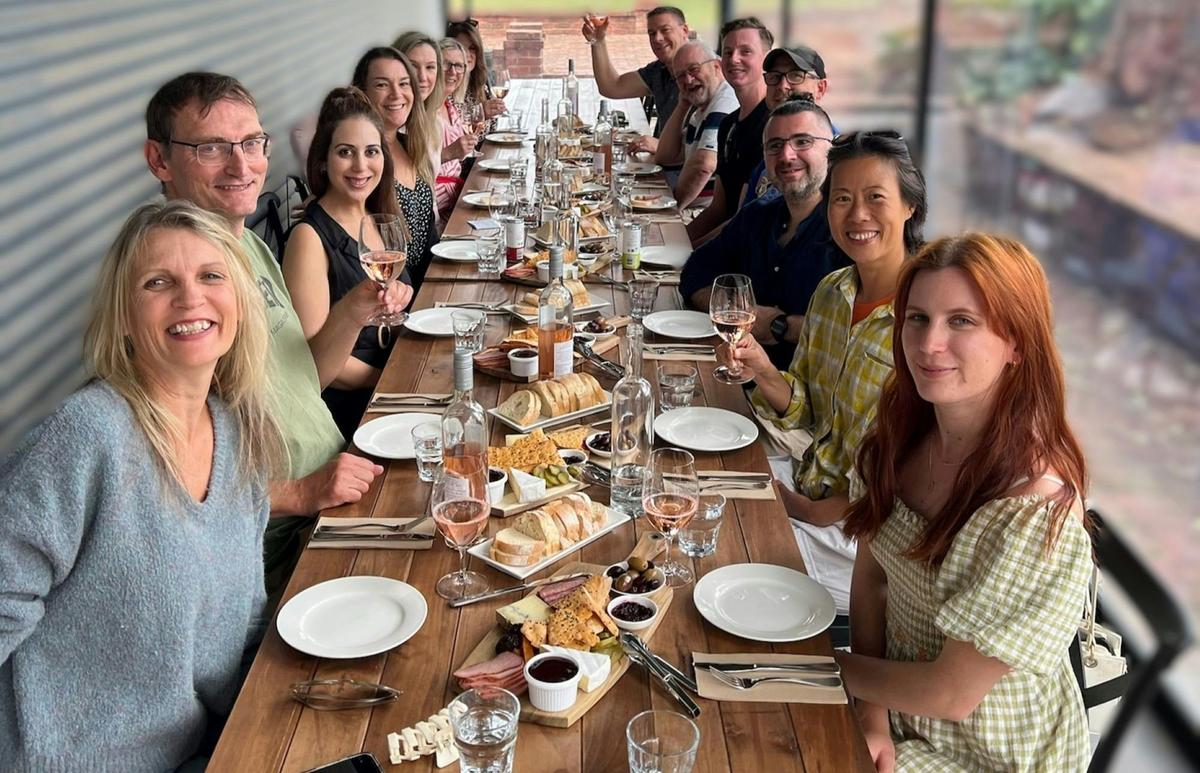 Group at lunch on a long table