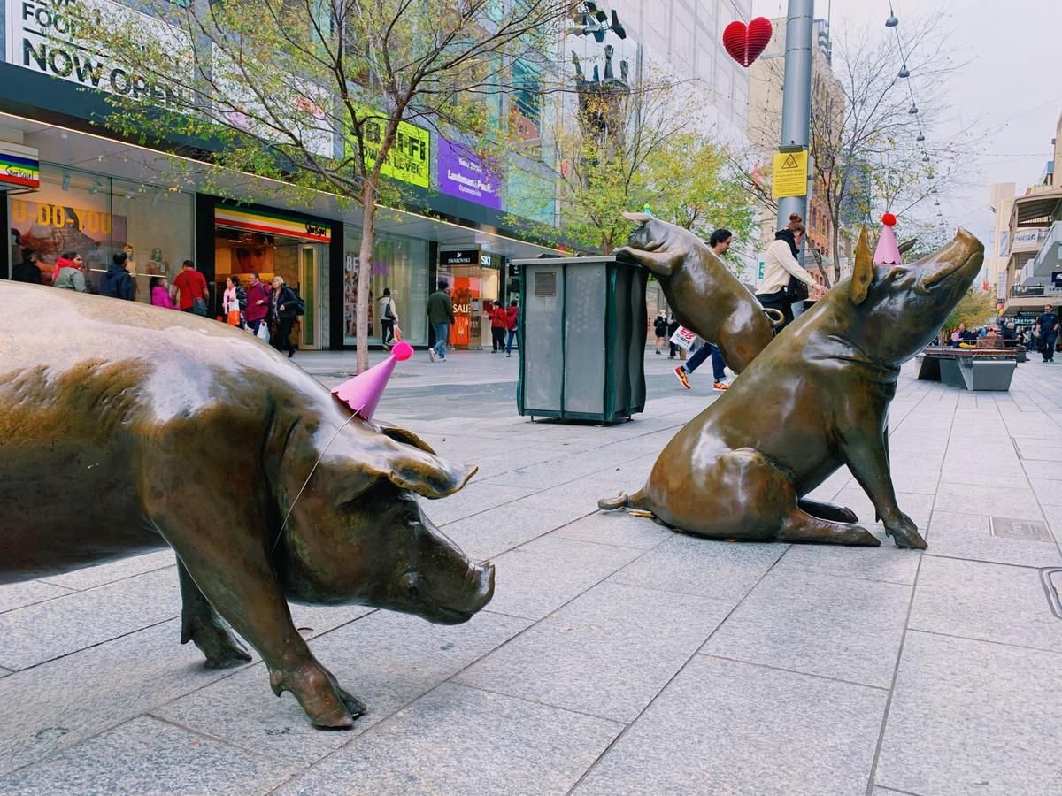 'A Day Out' pigs celebrating the installation's 21st birthday