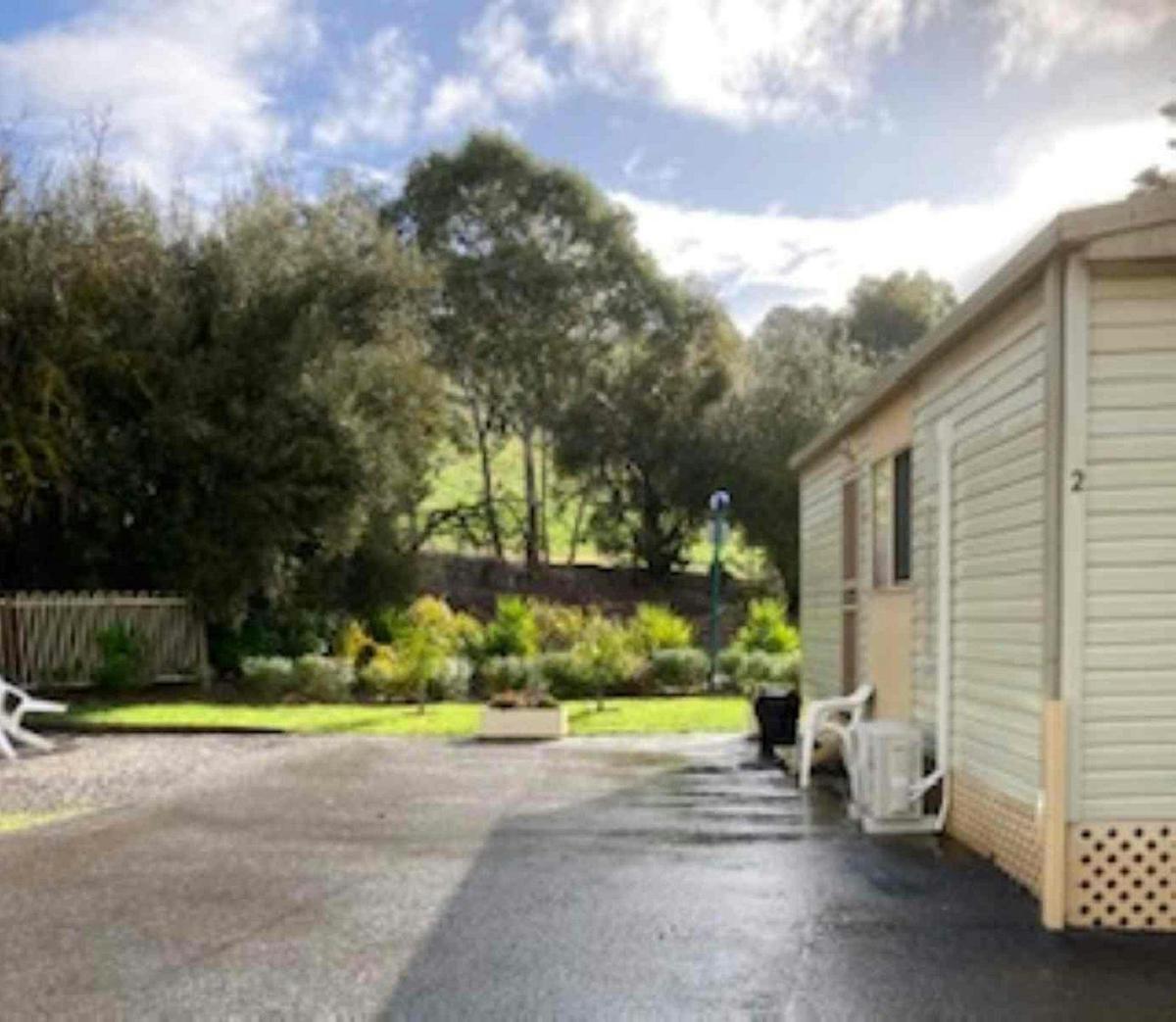 Common grassed area near cabin accommodation