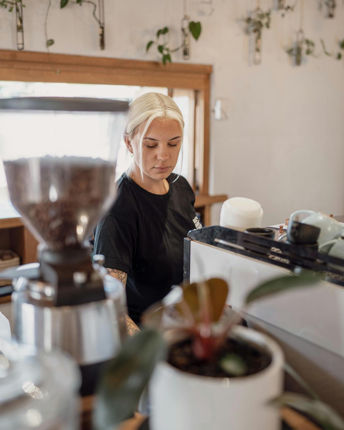 Barista making coffee