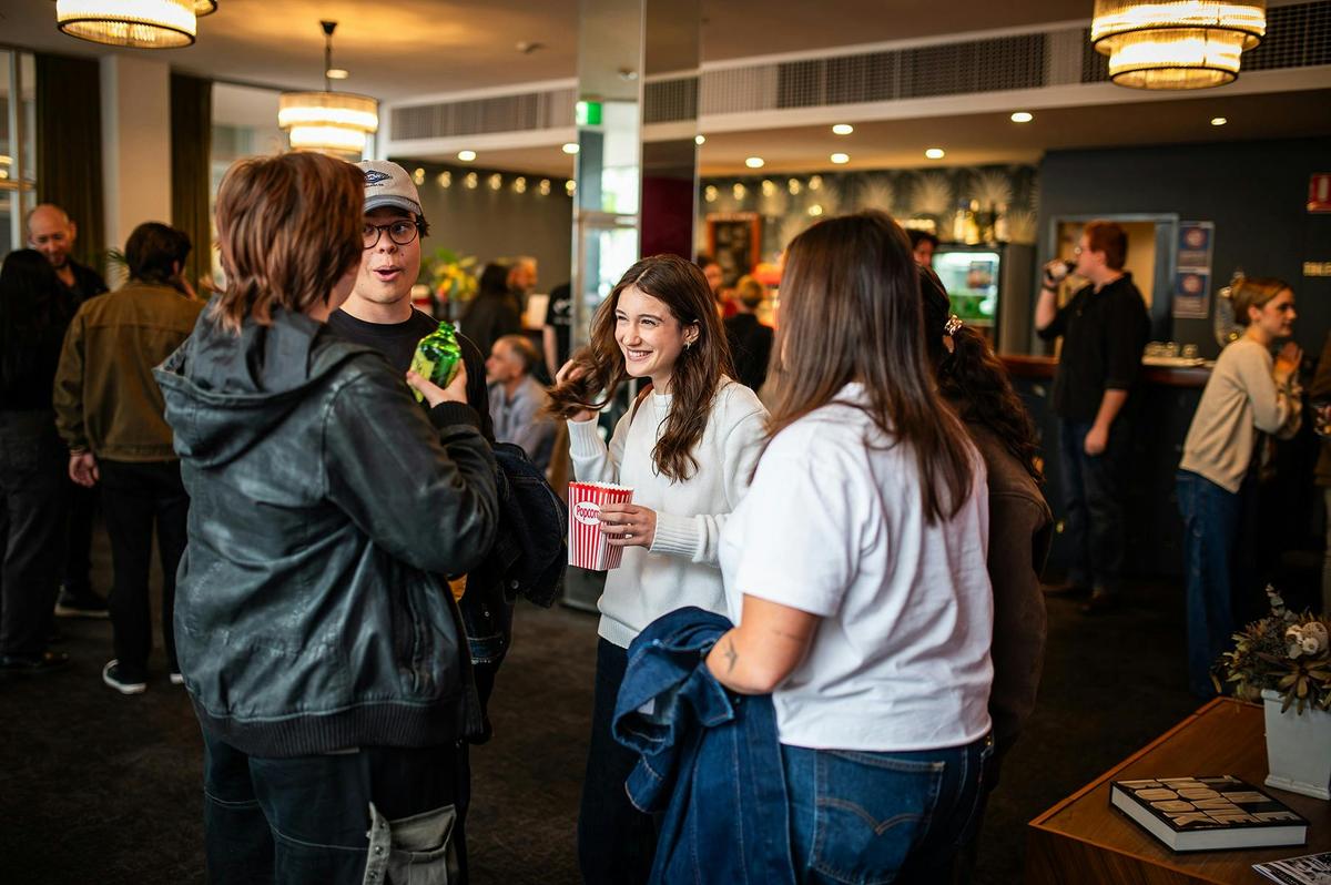 People in Cinema Foyer