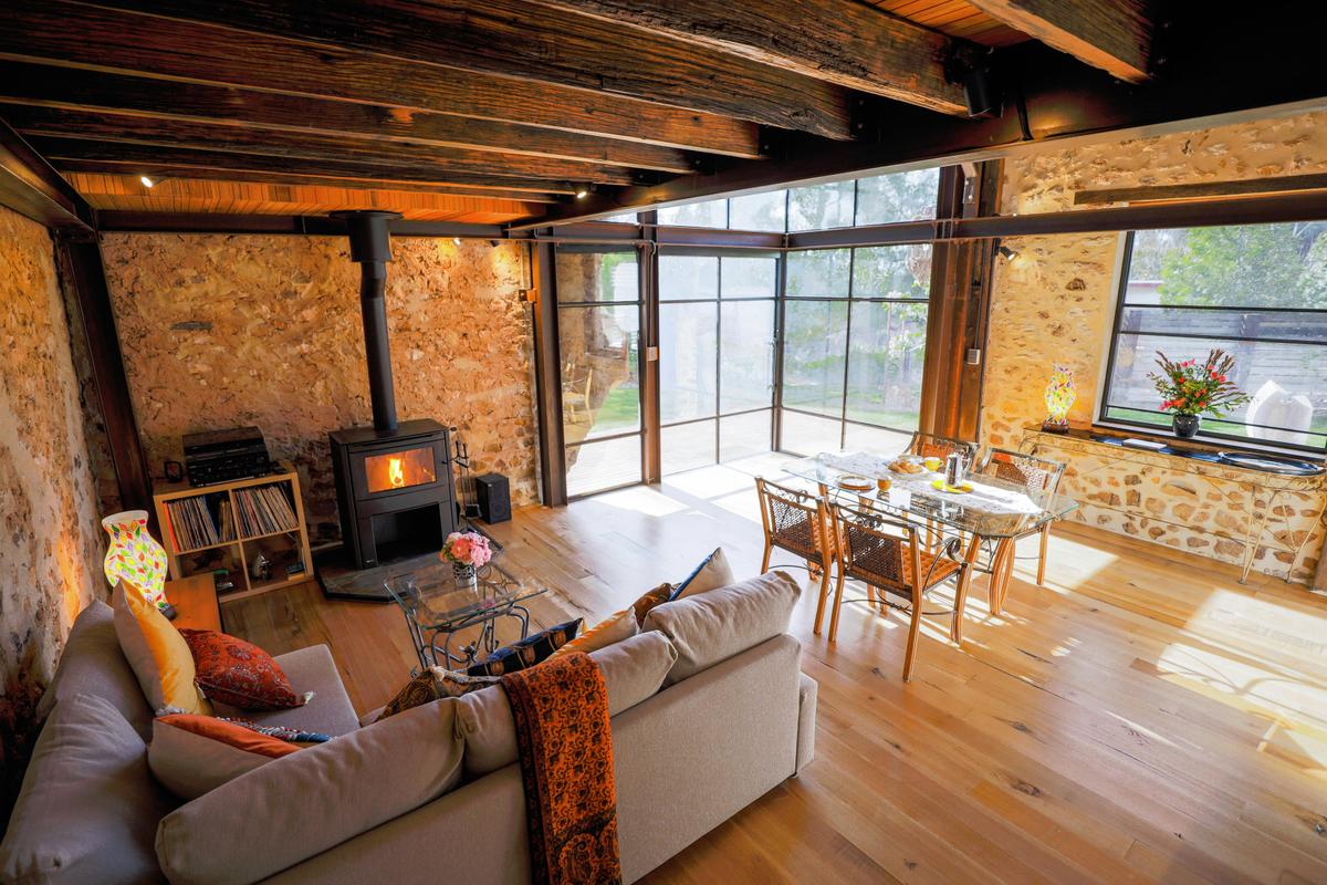 Living space with cozy combustion heater- "The Millery"