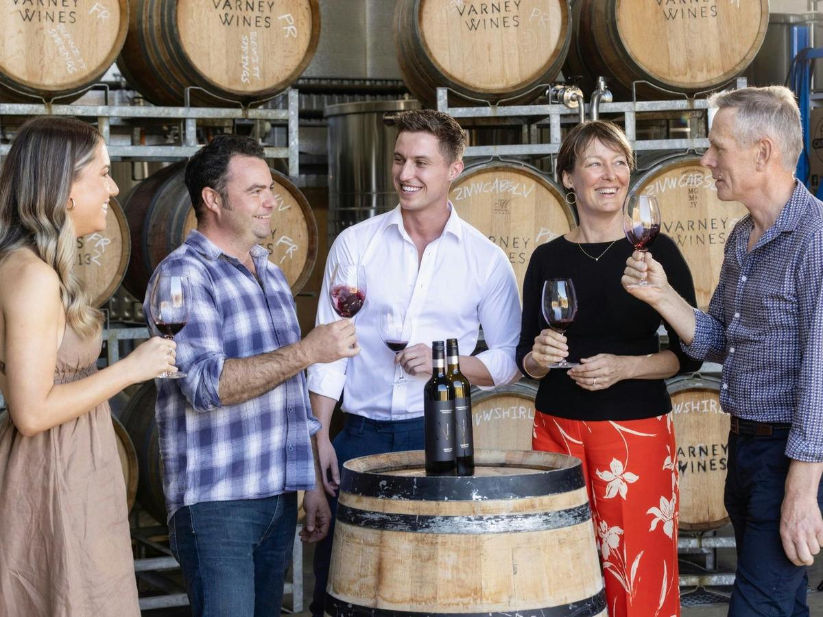 Winemaker Alan Varney with guests doing a premium wine tasting in the Winery.