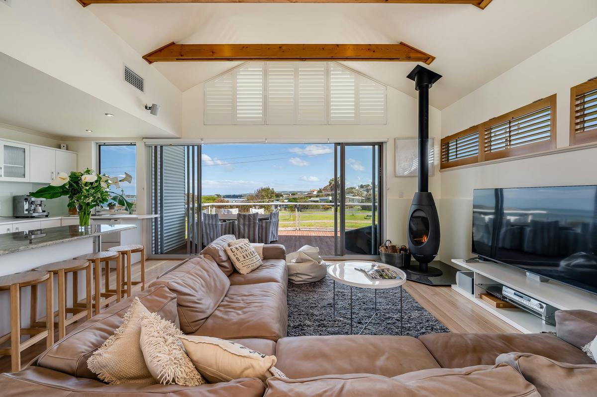 Lounge ,woodfire ,smart tv ,ocean ,island views ,open plan ,reverse  cycle a/c, front & back balcony
