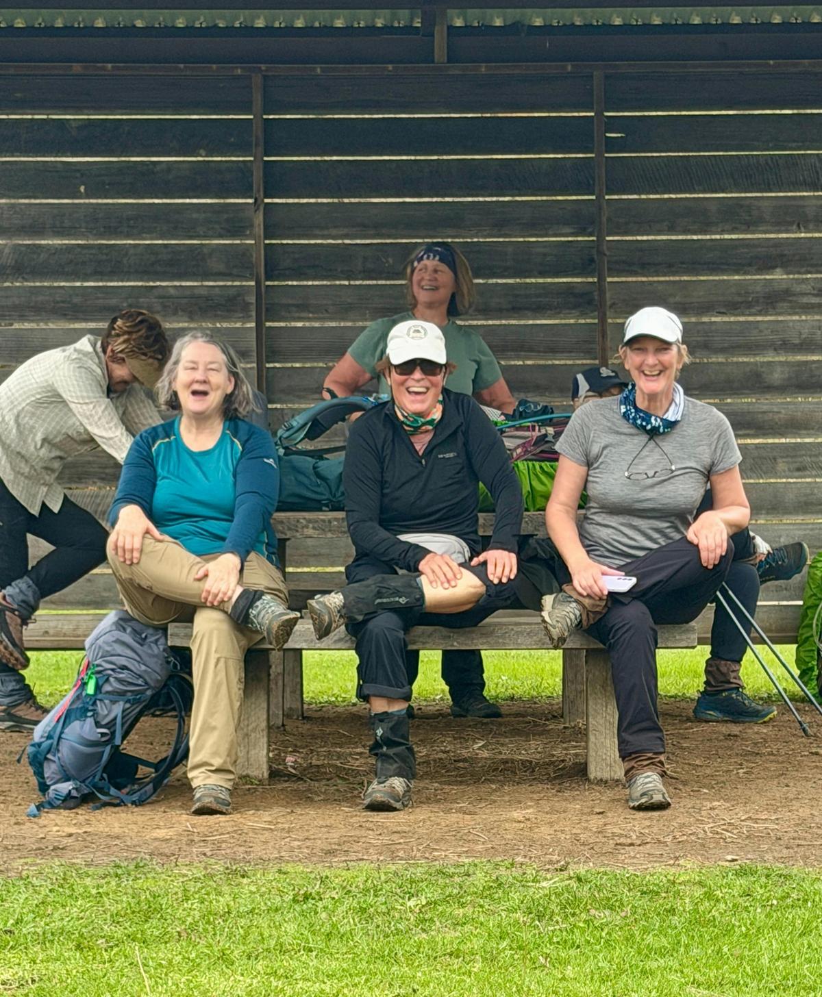 Women hikers stretching after a day on the trails with Women's Fitness Adventures