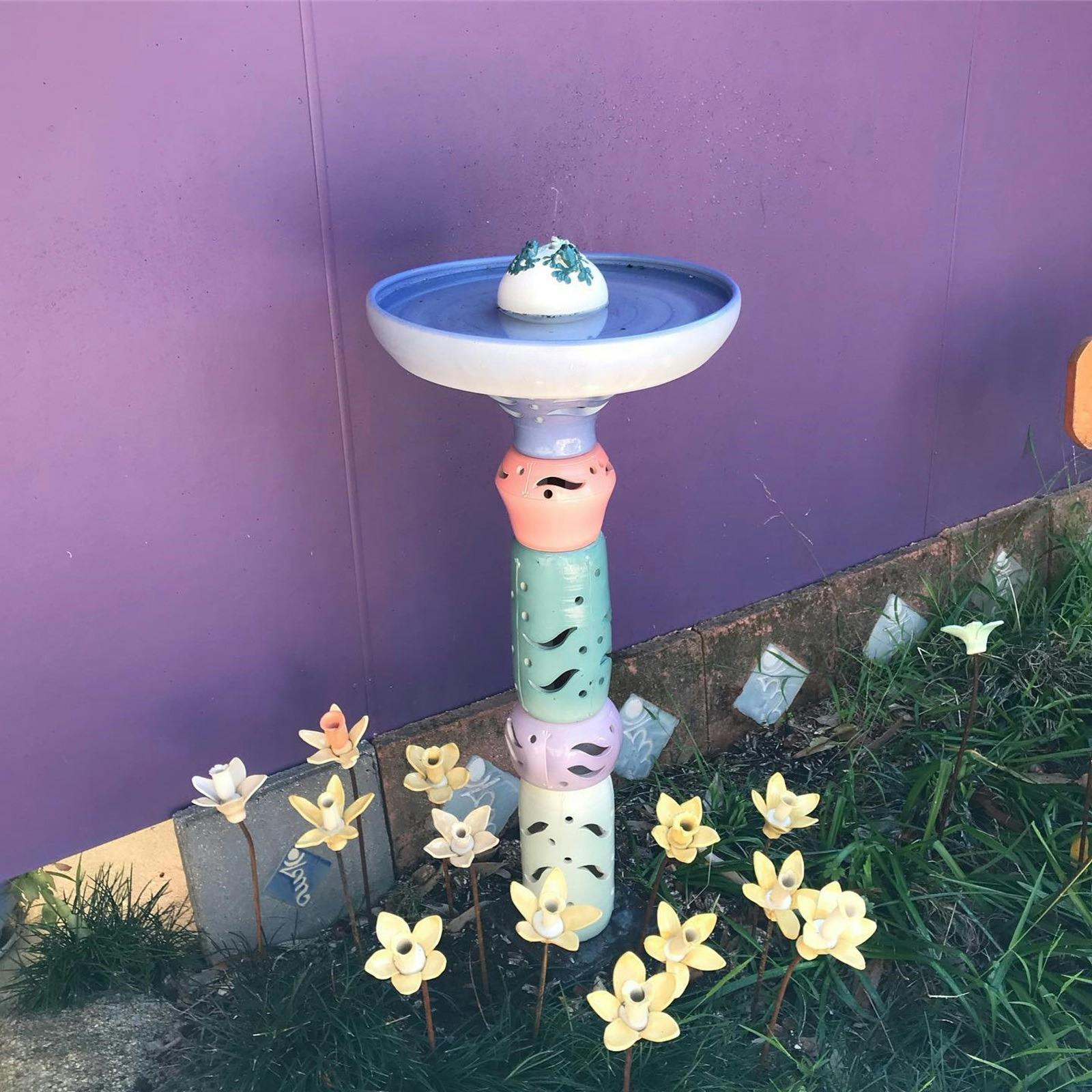 Bermagui Mudworks birdbath and flowers