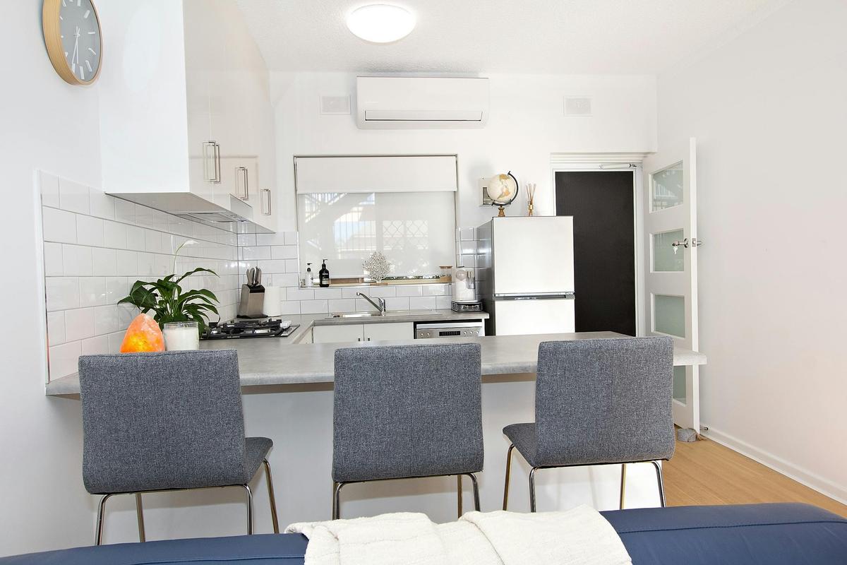 Breakfast bar with 3 stools