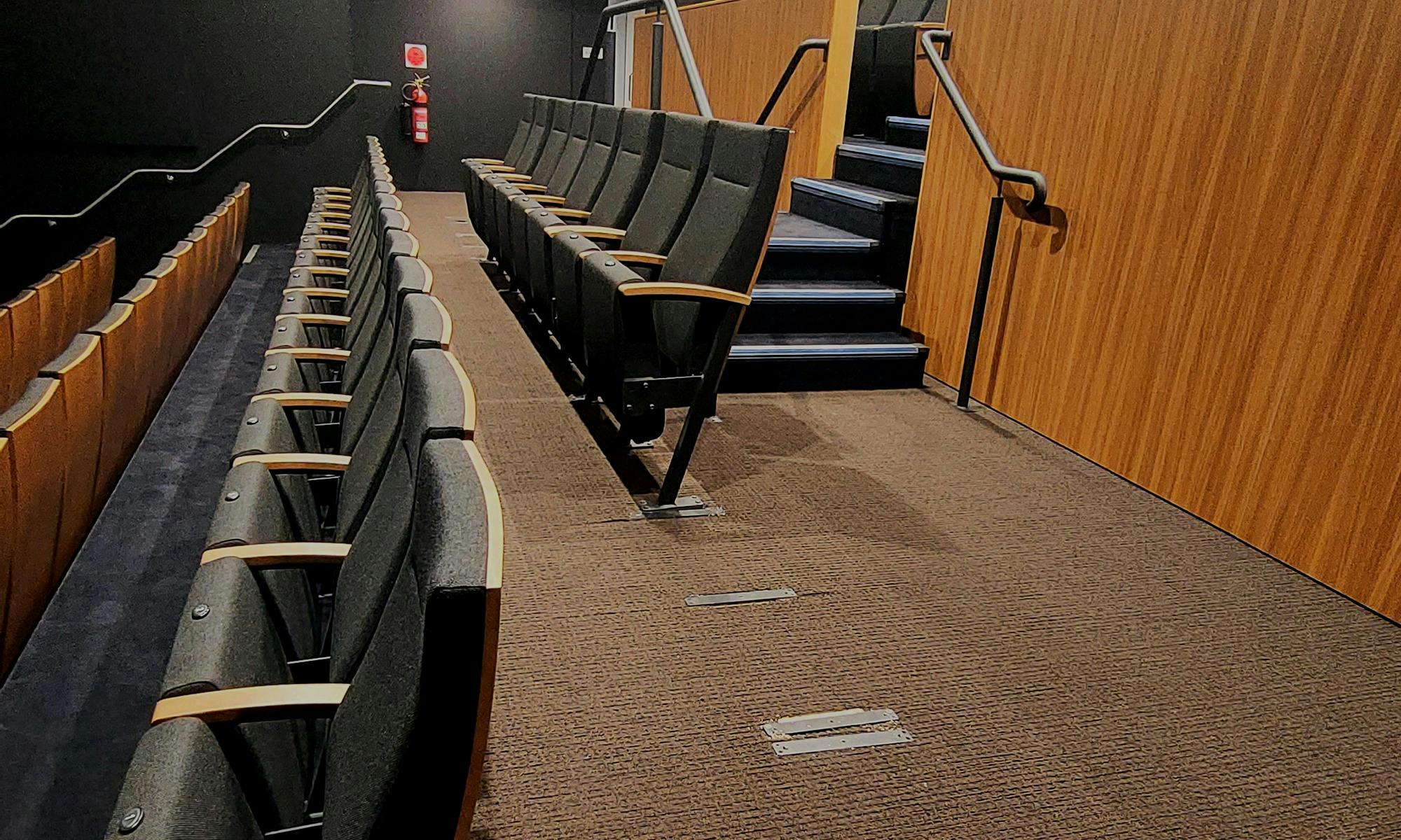 Row J in Theatre with seats removed for wheelchairs