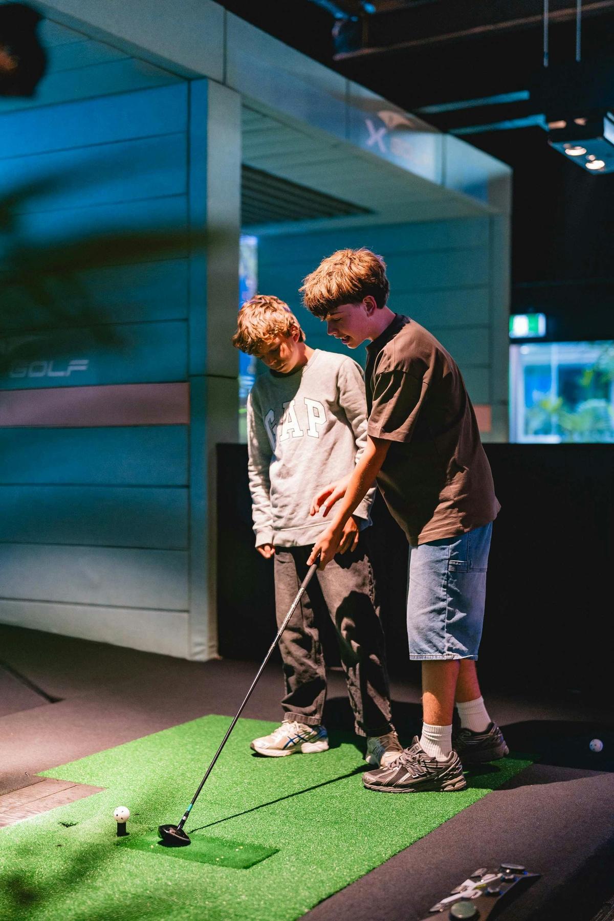 Kids Playing at X-Golf