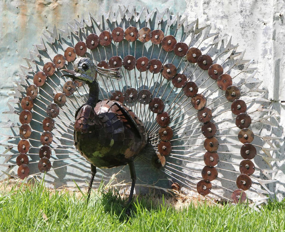 Peacock made from recycled metal