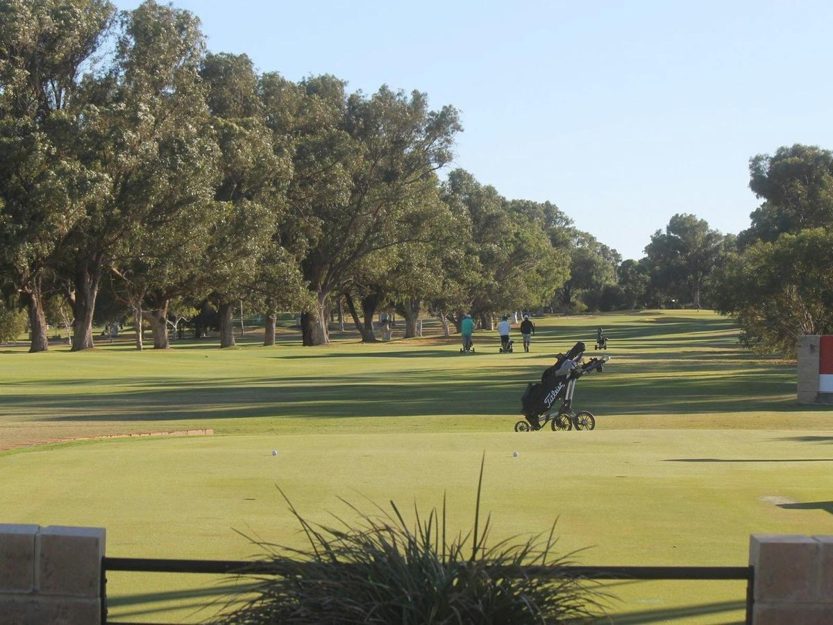 Putting green and 1st hole