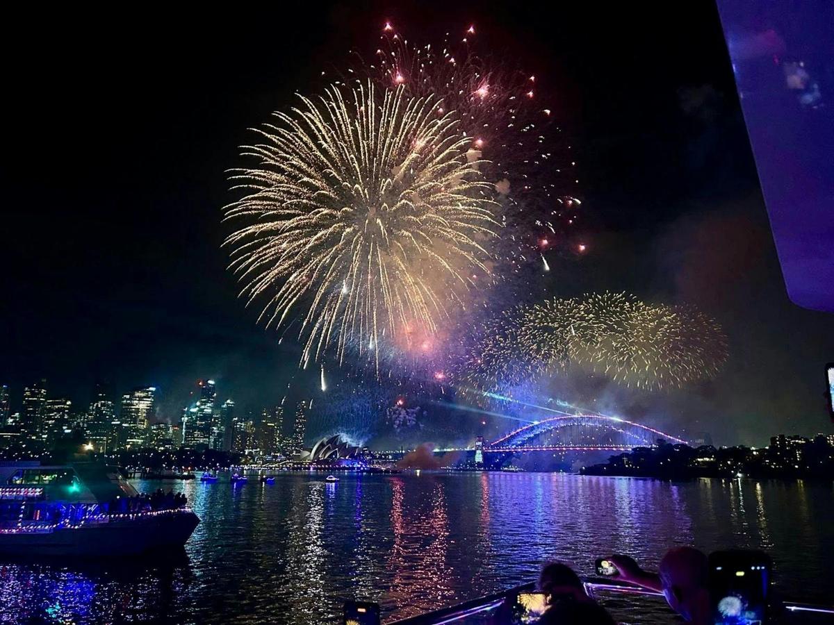 Front-row views of the Sydney midnight fireworks from the deck