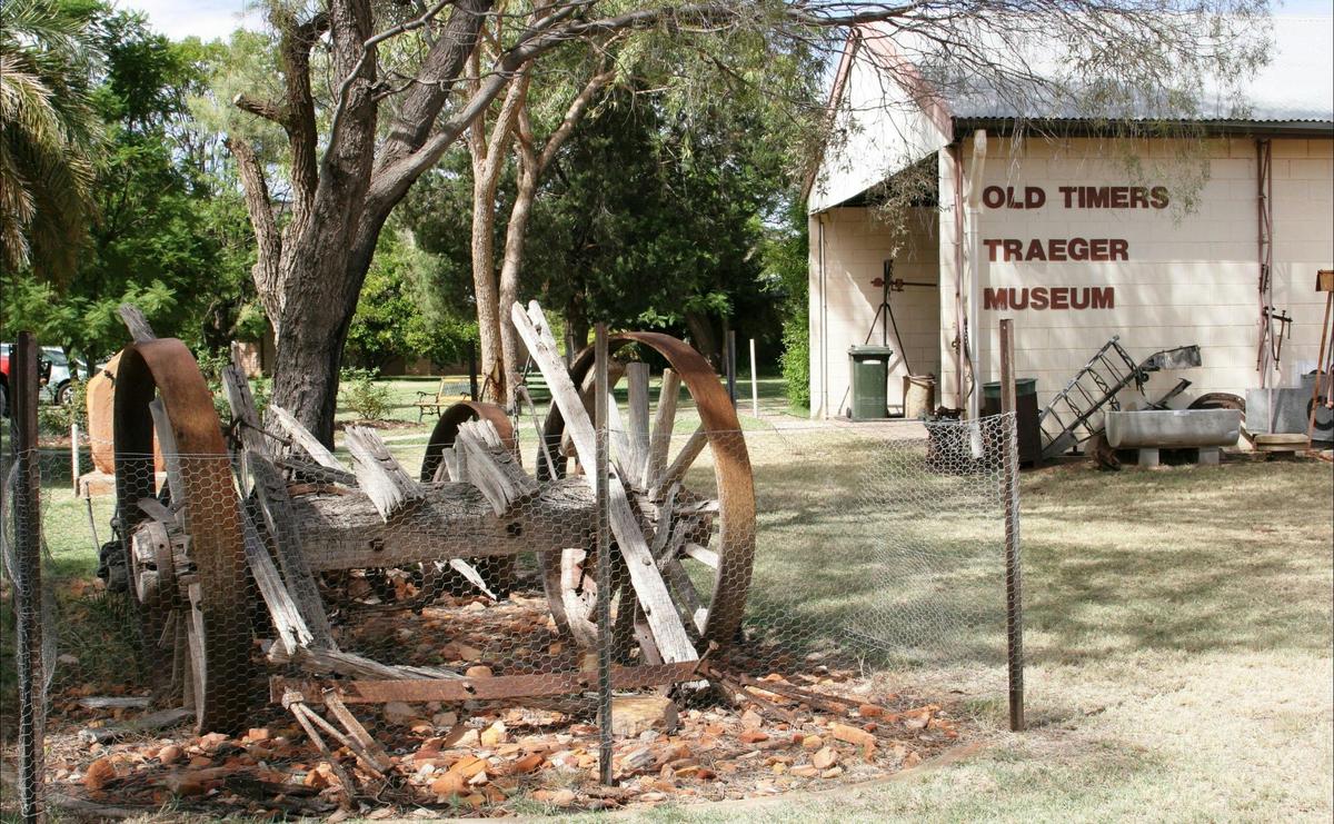 External view of museum. Old pioneer wagon belonging to Andrew Family in foreground.