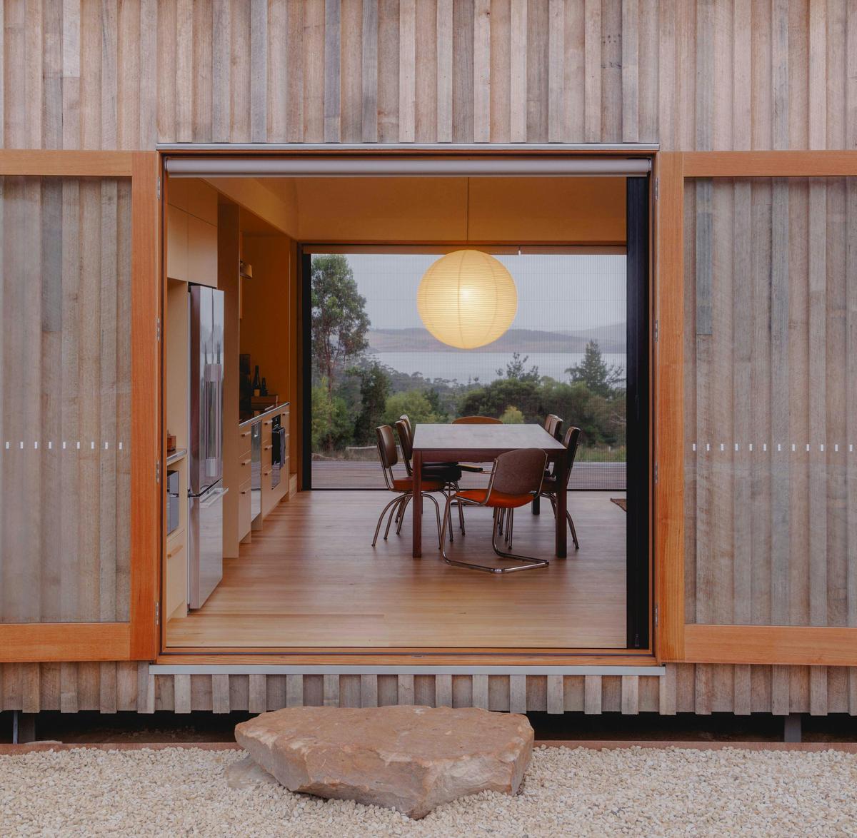 Stylish dining and kitchen with a view at Hidden Spring Beach holiday homeEast Coast Tasmania
