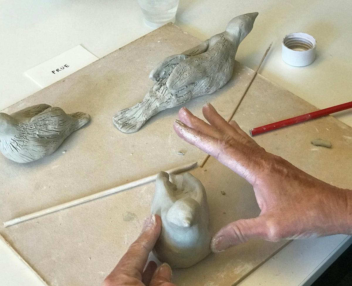 Crafting ceramic birds at Winmark