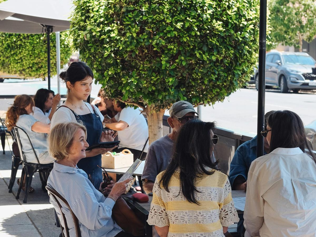 Outdoor dining at Common Room Co in Caulfield North, Melbourne.