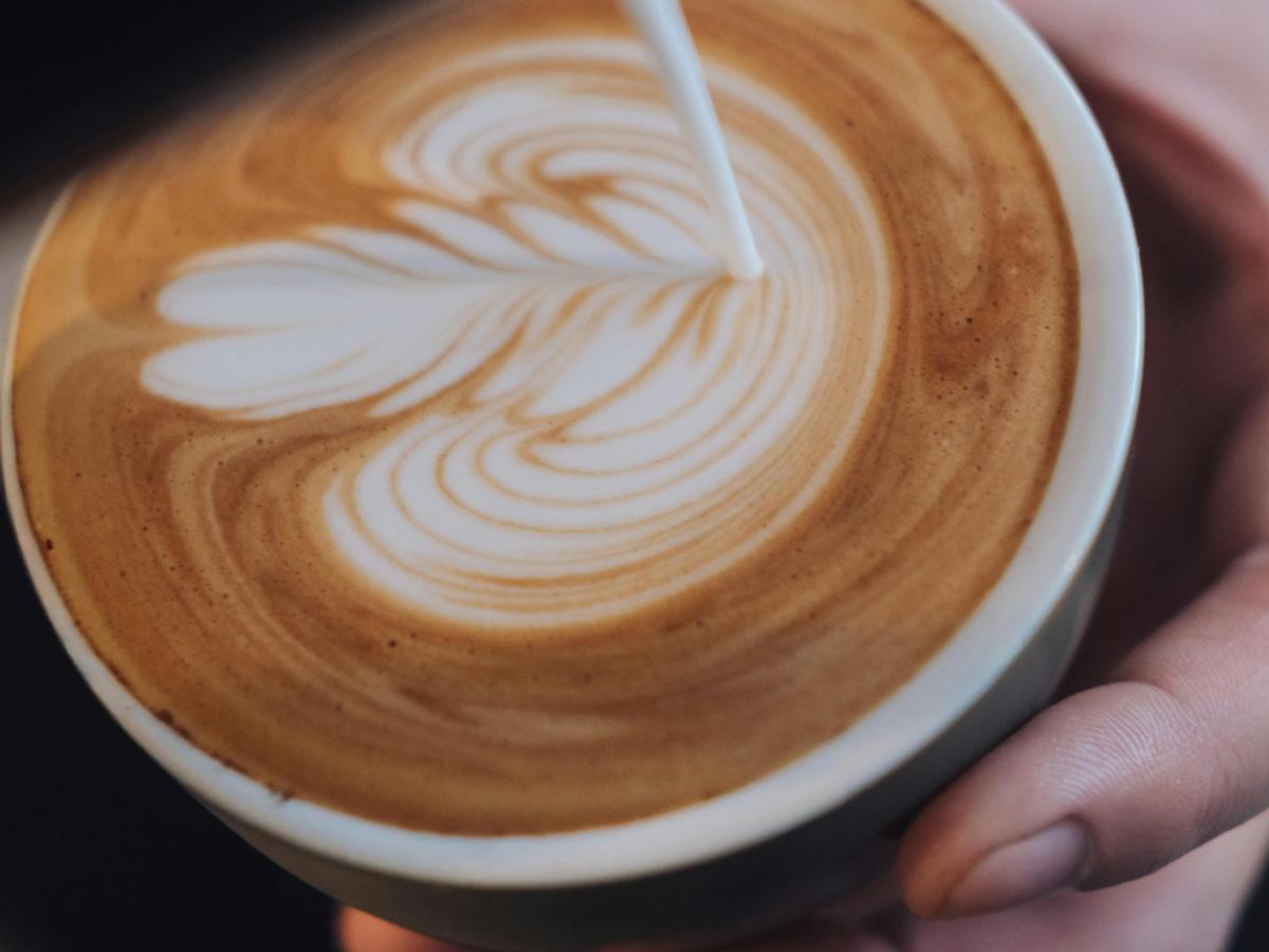 Specialty coffee with hand-poured latte art at Common Room Co in Caulfield North, Melbourne.