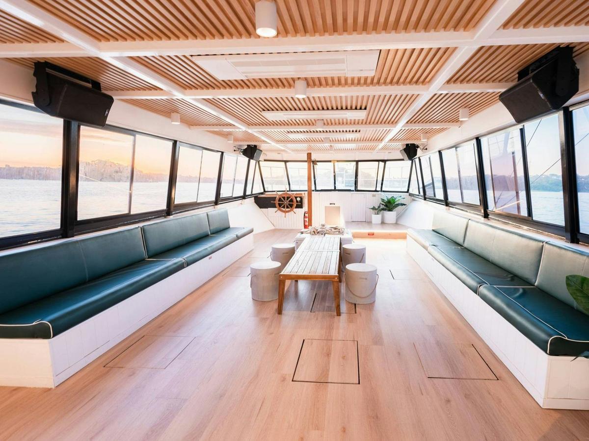 Zahara's indoor lounge, with comfortable seating and harbour views