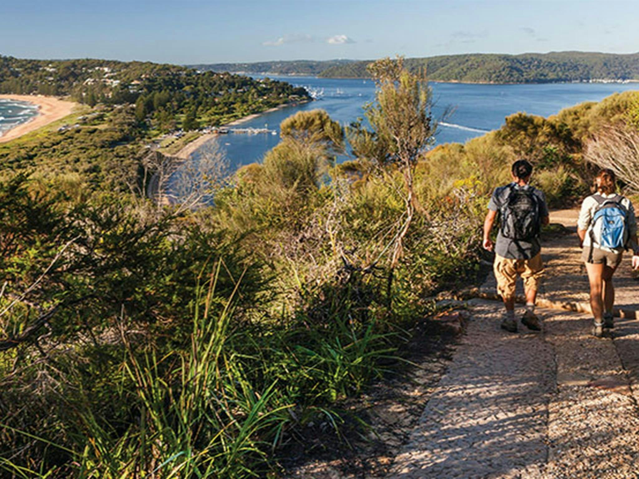 Walkers descending the track from Barrenjoey Head in Ku-Ring-Gai Chase National Park. Photo: D