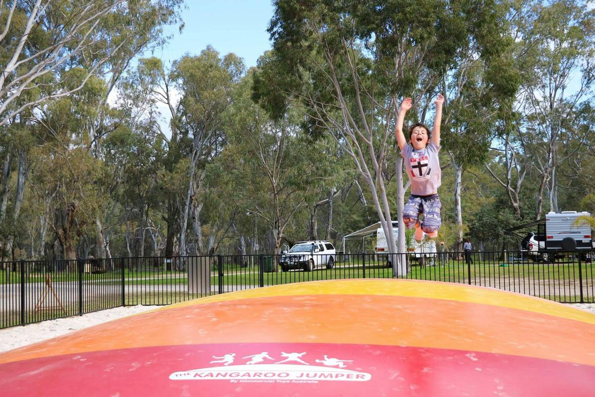 Child bouncing on the jumping pillow.