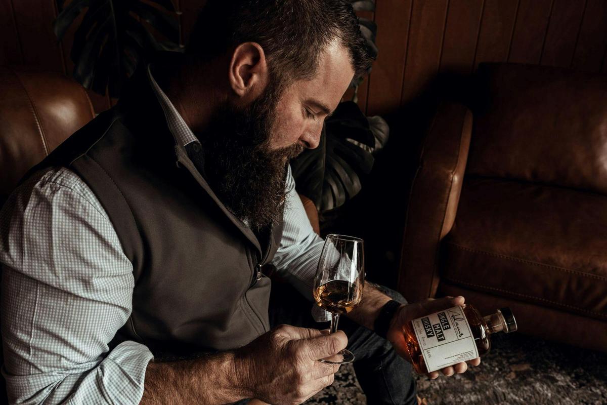 Adam tasting whisky