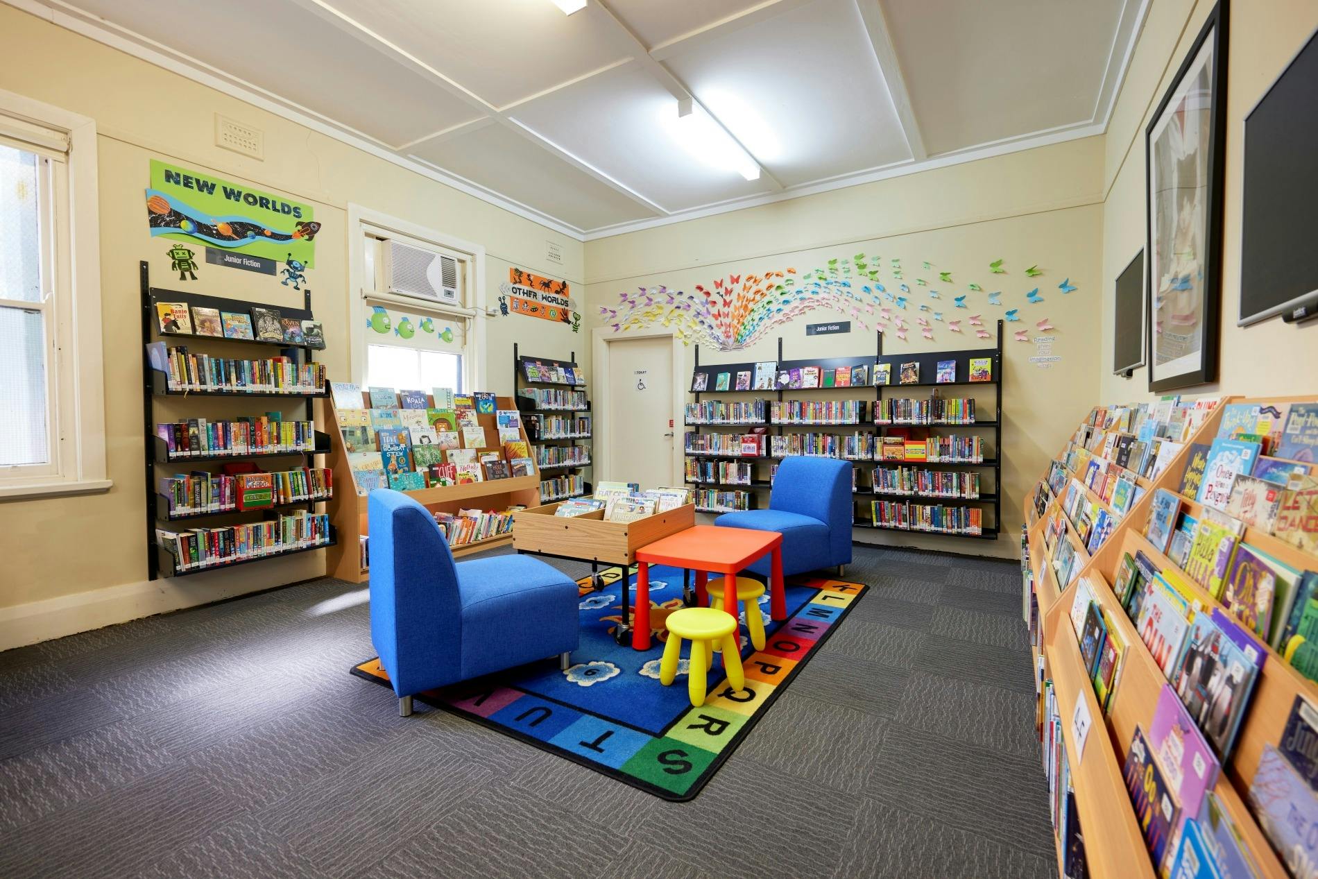 The cosy and colourful kids zone filled with books and games for the young.