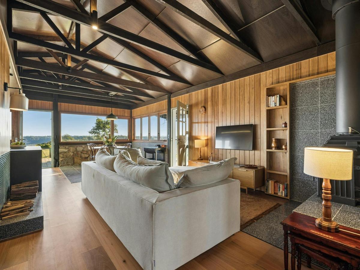 Cosy living room with indoor fireplace and Smart TV