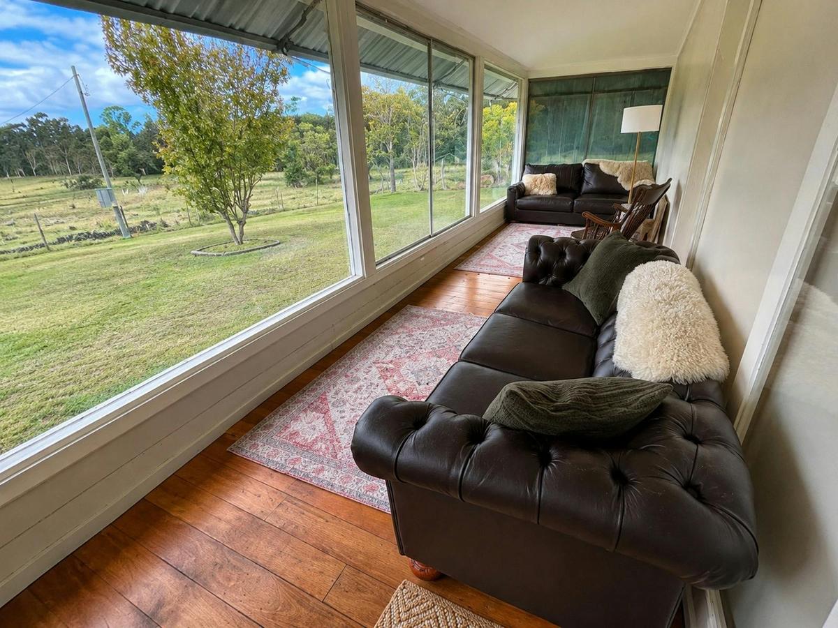 Sunroom overlooking the countryside at Adeline Estate