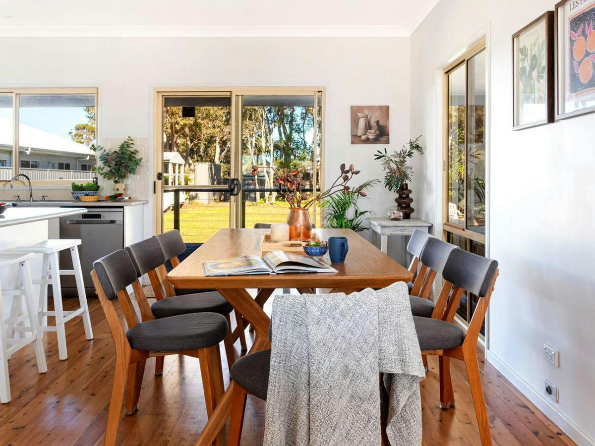 Beach Sanctuary | Dining area | Air conditioning | Breakfast bar | Access to back deck | 1km to loca