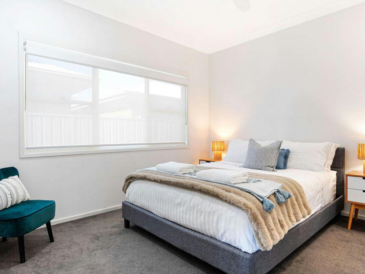 Beach Sanctuary | Bedroom 1 | Queen | Linen included | Ceiling fan | Heating | Travel Cot (BYO cot l