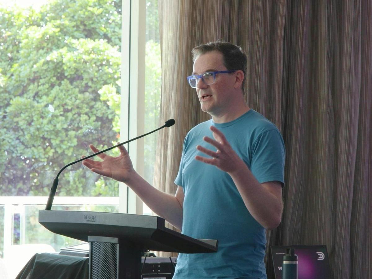 Ollie from Cloud Concepts presenting about The Anatomy of an AI-Powered Digital Business System.