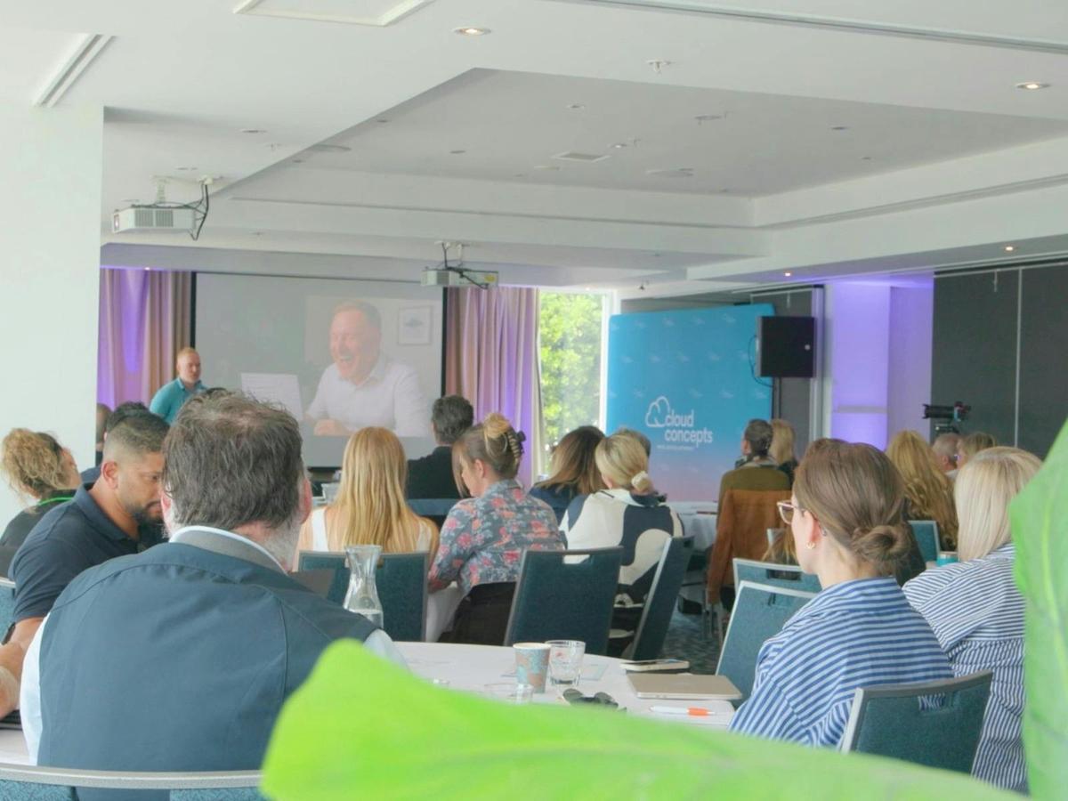 Atlassian representative giving business leaders an introduction to AI.