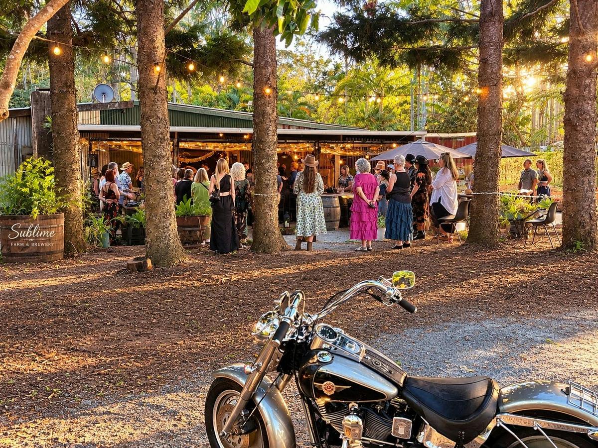 Weddings and celebrations under the trees at Sublime Farm & Brewery.