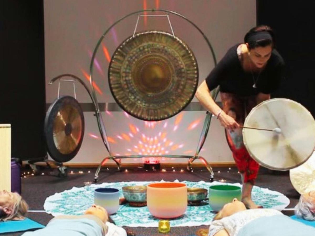 Instruments are played over guests and around the room.