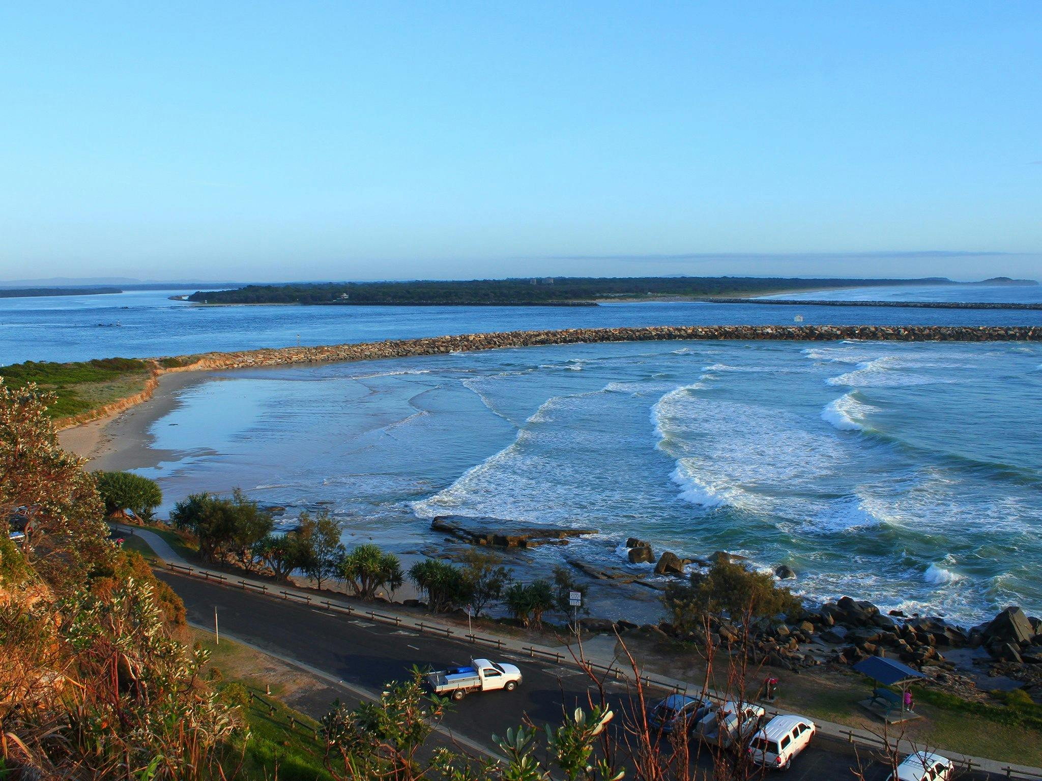 Looking down from Pilot Hill, Iluka Main Beach in the background, Iluka Bluff in the distance.