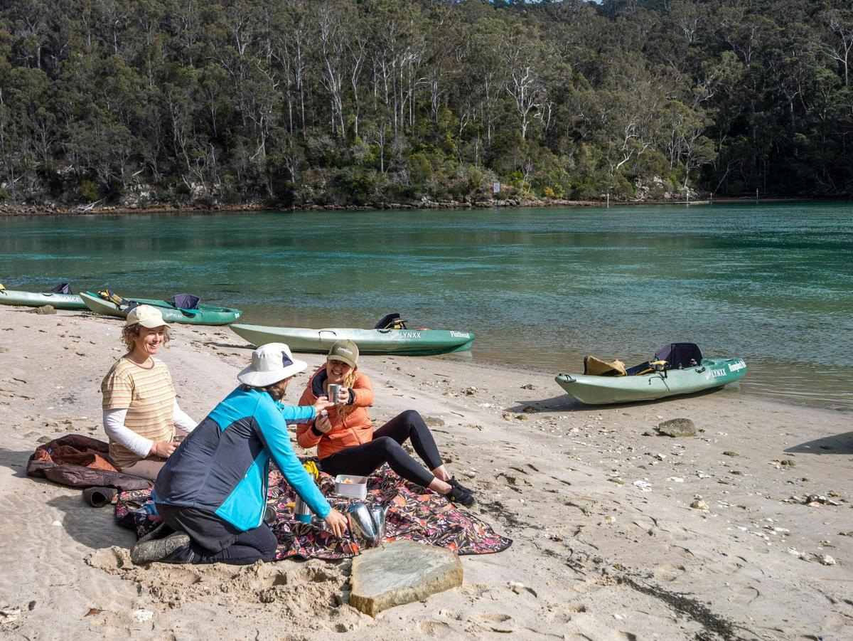 Guests enjoying a break along the rivers edge