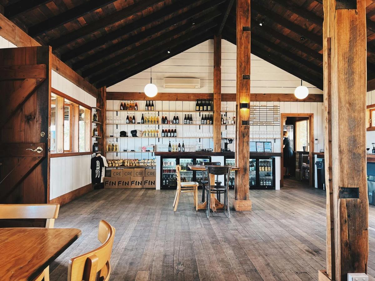 Inside the warm, timber-lined Fin Wines cellar door and tasting room.