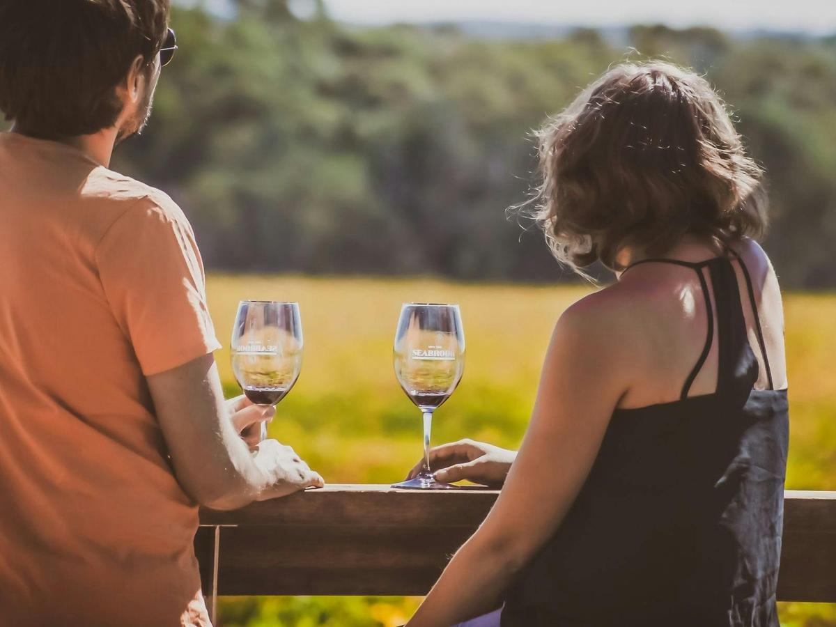 Couple tasting wine