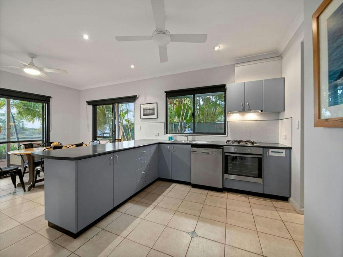 Modern kitchen with generous bench space and full size appliances