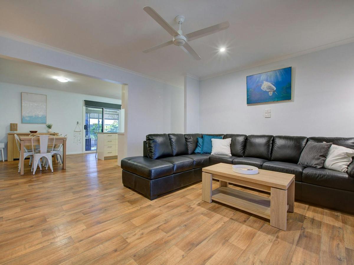 Spacious coastal living with a generous lounge and warm timber floors