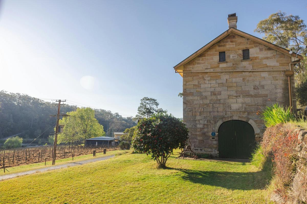 Tizzana Winery blue plaque