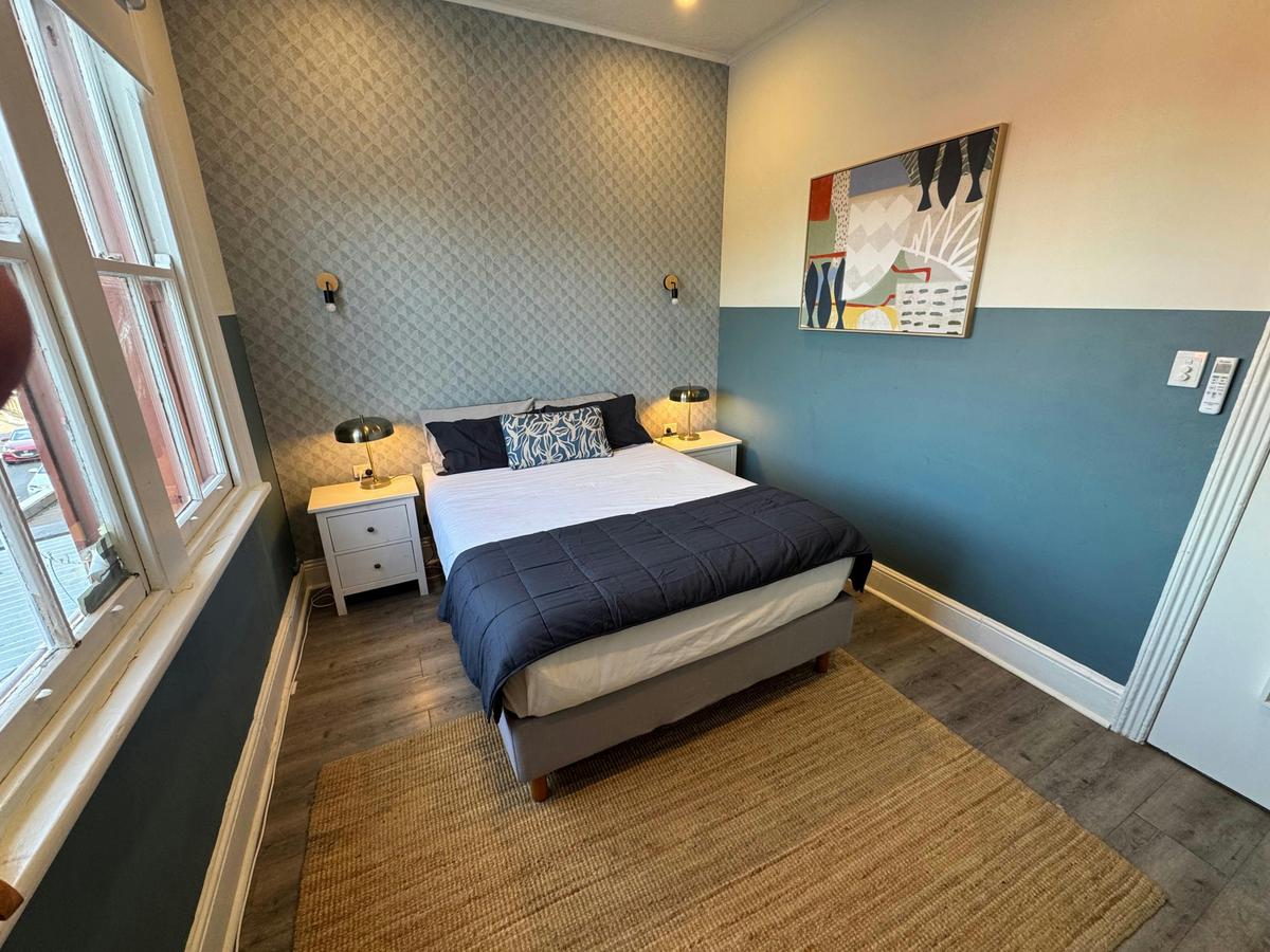 Bright guest room at Native Rose Hotel in Sydney’s Inner West.