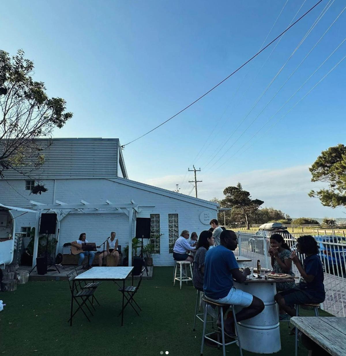 Open area with live music and chill vibes.