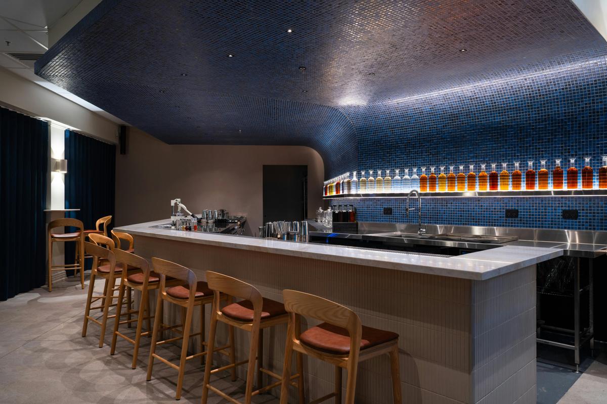 Grab a spot at the bar, and enjoy the show