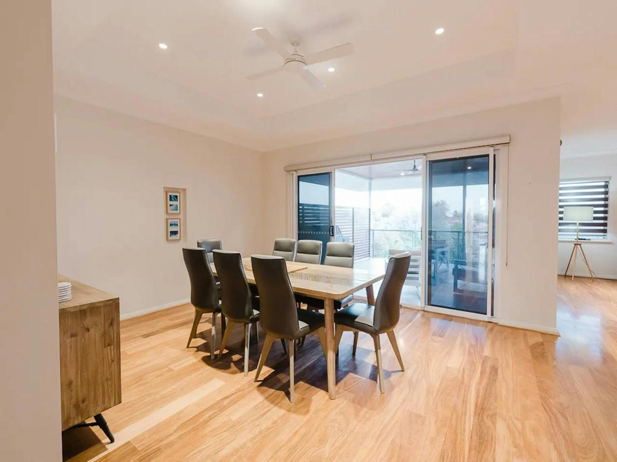 Spacious dining area opening directly onto the covered balcony
