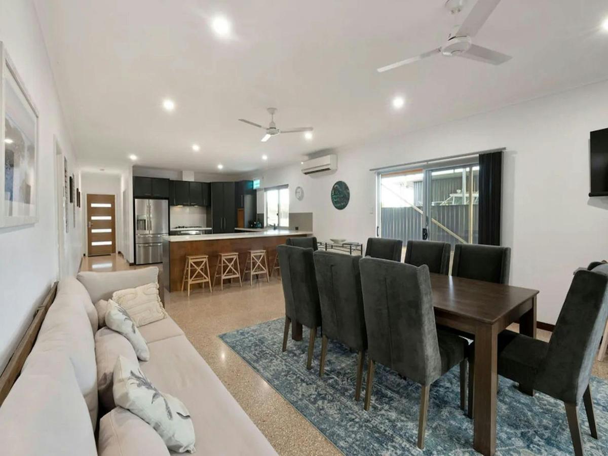 Bright open-plan living, dining and kitchen area with plenty of seating