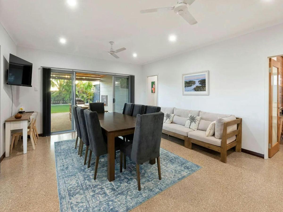 Spacious dining and lounge area opening directly to the covered patio